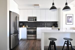 White Kitchen With Grey Backsplash